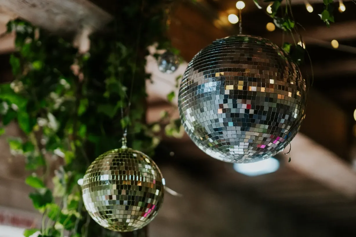 Hanging disco balls rustic event decor