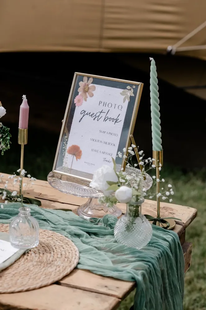 Pressed flower photo guest book sign with candles