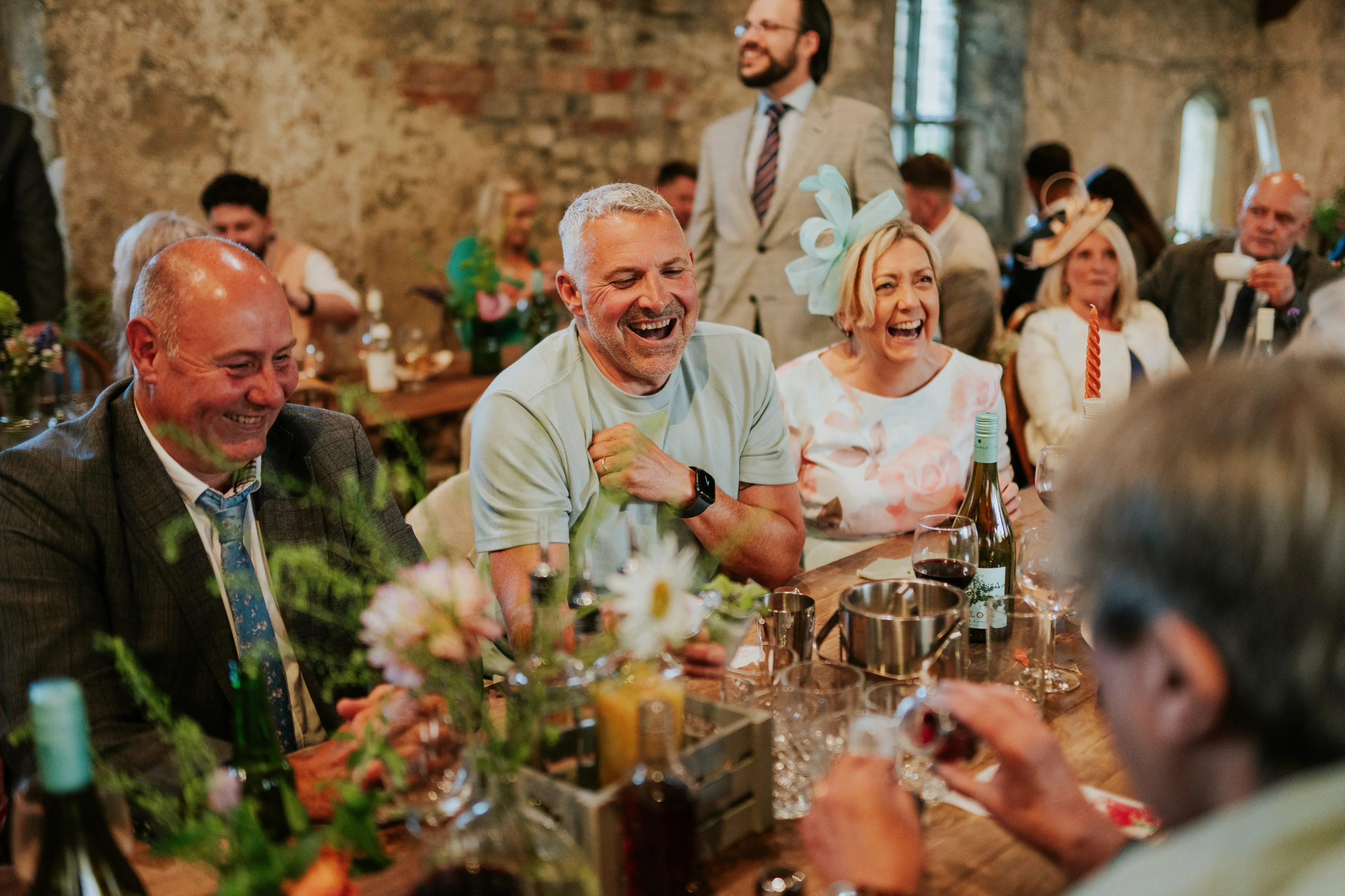 Wedding guests laughing cocktail masterclass