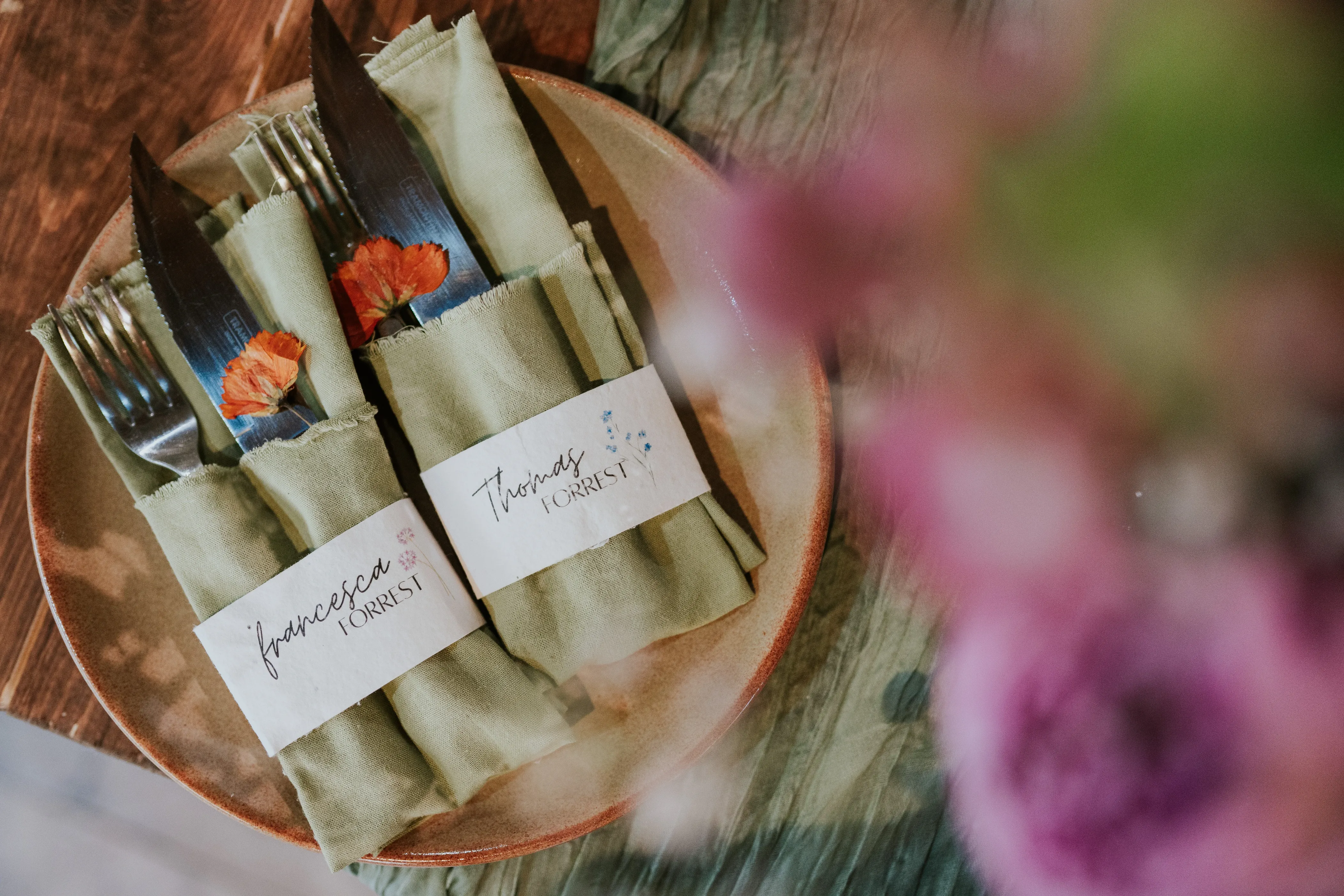 Wedding place setting green napkins name tags